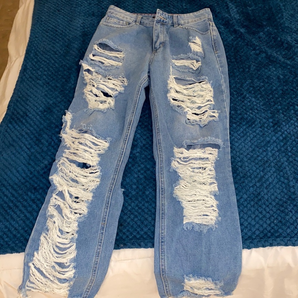 extra ripped blue jeans